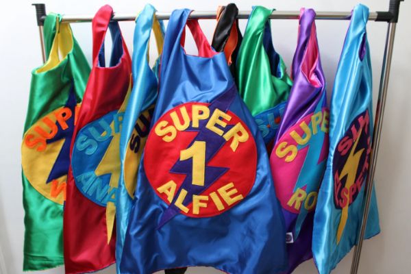 bundle of super hero capes for children's birthday parties