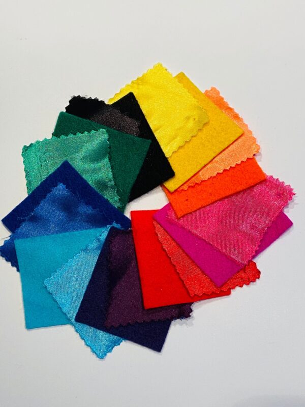 samples of all fabric colours (clockwise from top) - yellow, orange, pink, red, purple, turquoise, blue, green, black